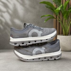 Grey running shoes on display.