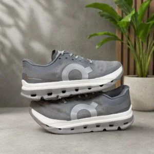 Grey running shoes on display.