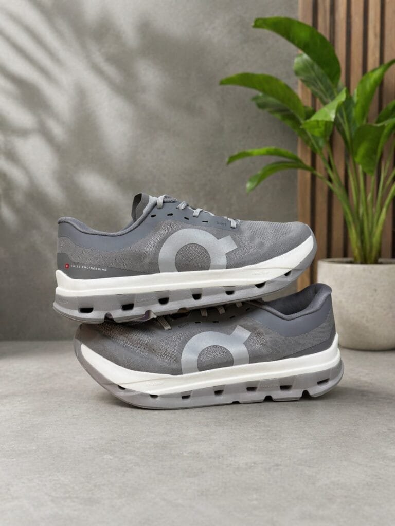 Grey running shoes on display.